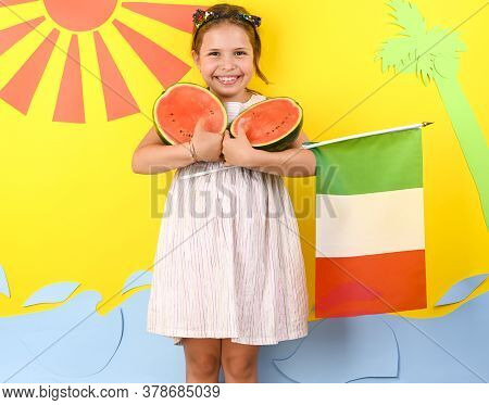 Little Girl On A Bright Background With The Italian Flag Holding A Fruit Basket In Her Hands. The Co