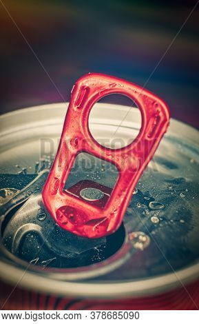 Macro Photo Of The Lid Of A Can Of Fizzy Drink Open With The Help Of A Ring-opener