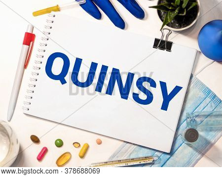 Quinsy Word On Wooden Cubes. Quinsy Concept. Medical Concept