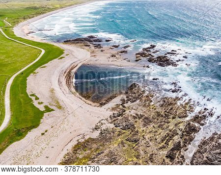 Aerial View Of The Beautiful Coast Next To Carrickabraghy Castle - Isle Of Doagh, Inishowen, County 