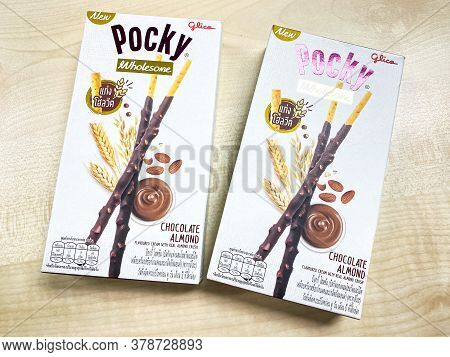 Bangkok Thailand - 30 July 2020: Glico Pocky Wholesome Biscuit Sticks Box New Flavour On The Wood Ta