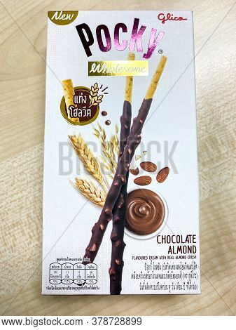 Bangkok Thailand - 30 July 2020: Glico Pocky Wholesome Biscuit Sticks Box New Flavour On The Wood Ta