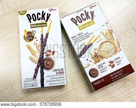 Bangkok Thailand - 30 July 2020: Glico Pocky Wholesome Biscuit Sticks Box New Flavour On The Wood Ta