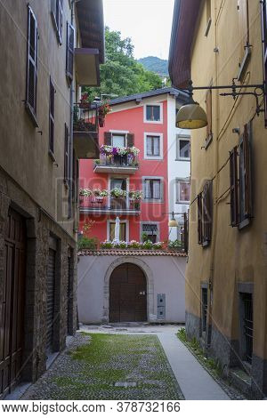 Breno, Brescia, Lombardy, Italy: Historic Town In The Oglio Valley. Typical Street