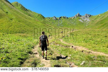 man hiking Sancy Puy in France