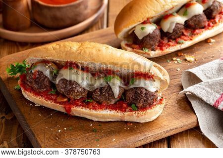 Meatball Sandwich With Tomato Sauce And Cheese On A Hoagie Roll