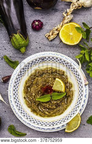 Eggplant Dip Baba Ganoush (mutabbal) Or Mezze With Ripe Vegetables And Fresh Herbs