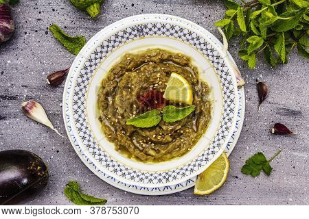 Eggplant Dip Baba Ganoush (mutabbal) Or Mezze With Ripe Vegetables And Fresh Herbs