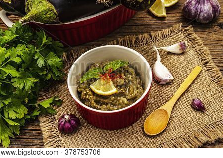 Eggplant Dip Baba Ganoush (mutabbal) Or Mezze With Ripe Vegetables And Fresh Herbs