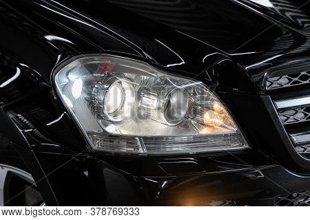 Novosibirsk/ Russia - July 18  2020: Mercedes Benz Gl-class,  Black Car Headlights. Exterior Detail.