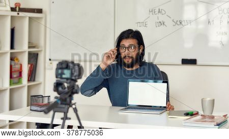 Young Professional Programming Tutor Recording Video Tutorial For His Blog On Professional Digital E
