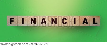 Text Financia On Wooden Cubesl. Business Concept