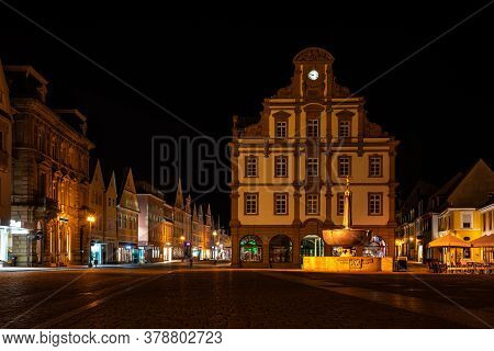 Speyer, Germany - Mar 14, 2020: The Facade Of The Old Mint, Alte Muenze In Speyer In Germany At Nigh