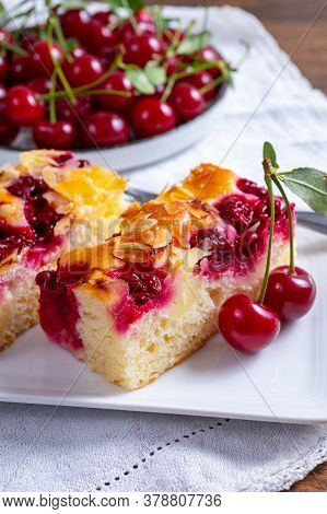 Fresh Baked Cake With Red Ripe Juicy Sour Cherry Or Kriek Berry Close Up