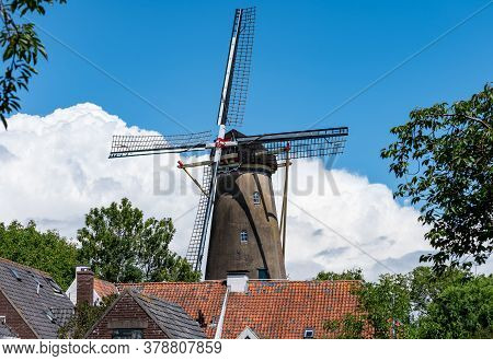 Old Dutch Windmill In Little Ancient Town With Big History Buren, Gelderland, Netherlands