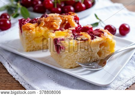 Fresh Baked Cake With Red Ripe Juicy Sour Cherry Or Kriek Berry Close Up