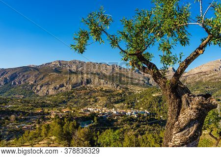 Benimantell, Spain - March 27, 2019: Spanish Mountains Rocky Landscape With Benimantell Valencian To