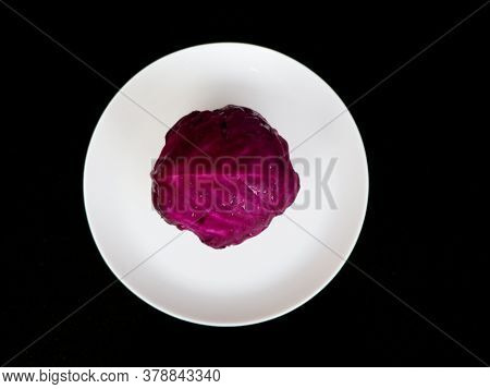 Fresh Raw And Organic Violet Color Cabbage In White Plate