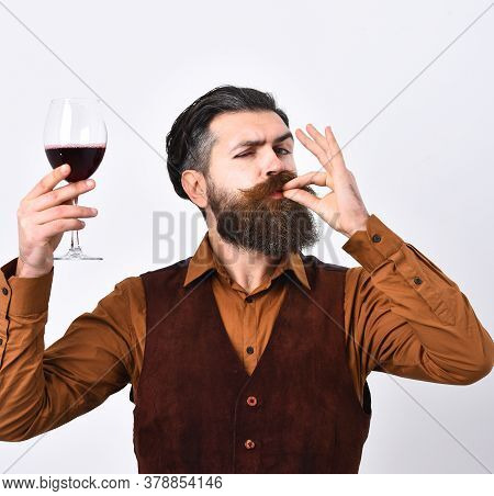Barman With Satisfied Face Holds Italian Alco Drink