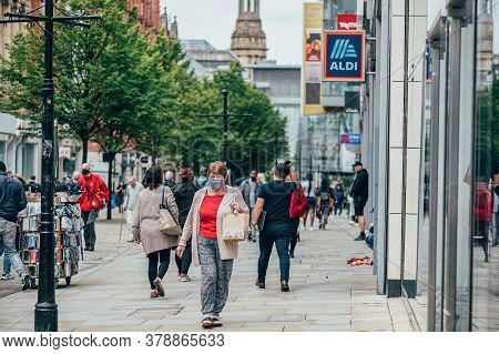Manchester, England, Uk - 24 July, 2020 City Centre Of Manchester, People In Face Masks While Shoppi