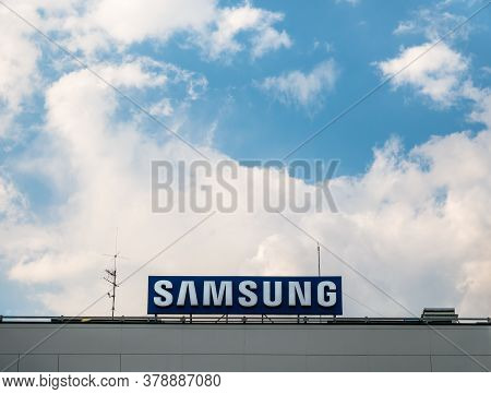 Bucharest/romania - 07.18.2020: Samsung Logo Against Blue Sky Samsung Offices In Bucharest, Romania.