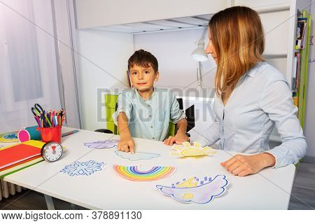 Boy With Autism Spectrum Disorder Learn Weather Using Cards, Teacher During Aba Therapy Class