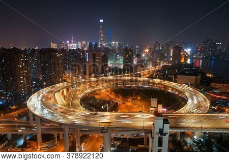 Shanghai Nanpu Bridge over Huangpu River with busy traffic in China.