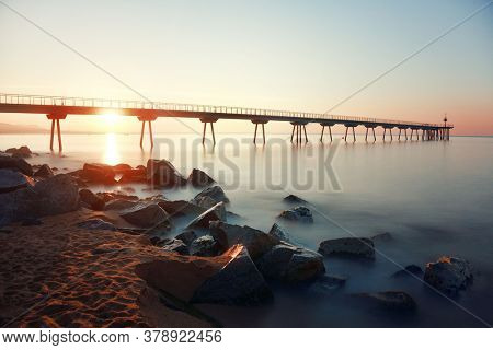 Pont Del Petroli at sunrise in Barcelona in Spain