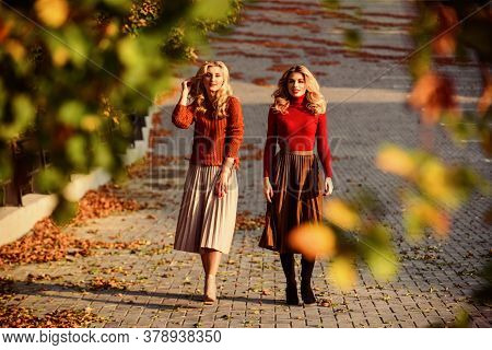 Time To Relax. Girls In Corrugated Skirt And Sweater. Female Beauty. Real Femininity. Autumn Women O
