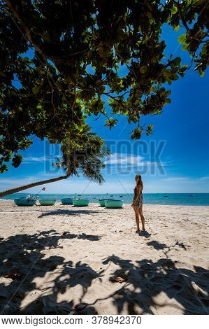 Young Sexi Woman On Palm In Vietnam