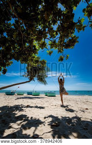 Young Sexi Woman On Palm In Vietnam