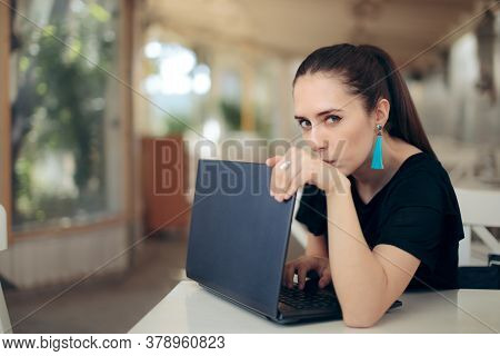 Woman With Laptop Worried About Online Privacy Of Personal Data