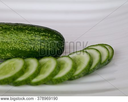 Fresh Raw Cucumber With Sliced Ones