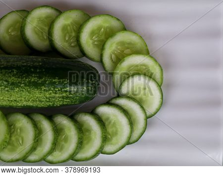 Fresh Raw Cucumber With Sliced Ones