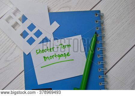 Shorter-term Mortgage Text Write On Sticky Notes Isolated On Office Desk.