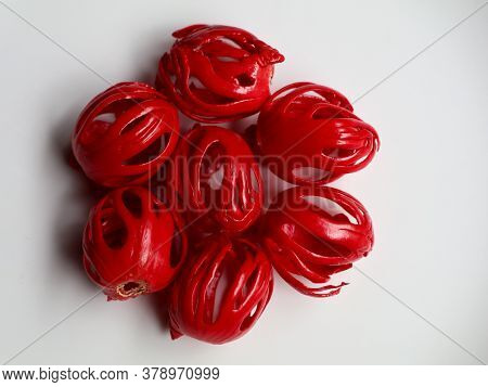 Fresh Red Color Nutmeg Mace,thev Seed Covering  Kept Against White Background