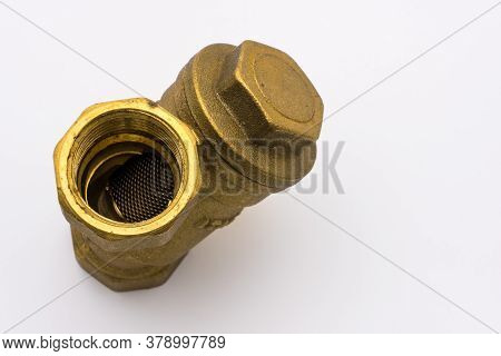 Brass Coarce Filter For Plumbing Work. Isolated On White Background, Closeup. Copy Space.