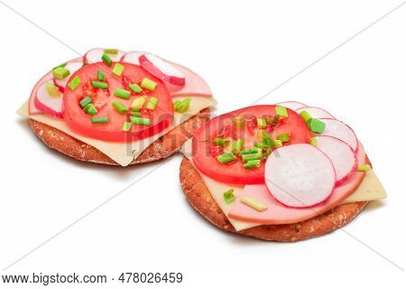 Crispy Cracker Sandwiches With Tomato, Sausage, Cheese, Green Onions And Radish - Isolated On White.