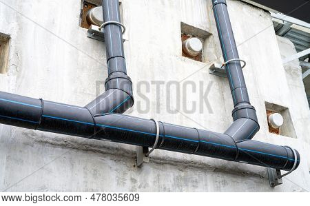 Polyethylene Pipes Drain Water From Sky Train Tracks. Hdpe Pipeline Drainage. Black Pe Tube Was Inst