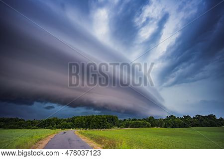 Angry Supercell Storm Influenced By Climate Change. Dangerous Storm Supercell Shelf Cloud With Layer