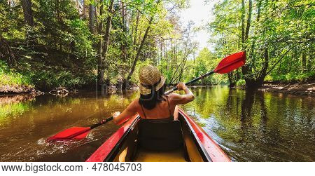 Back View Kayaking Couple In River. Pov Of Woman And Man Kayaking In Beautiful Landscape. Aquatic Sp