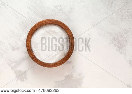 Succinic Acid Powder In Wooden Bowl, Top View. Butanedioic Acid Or Spirit Of Amber. Chemical Formula