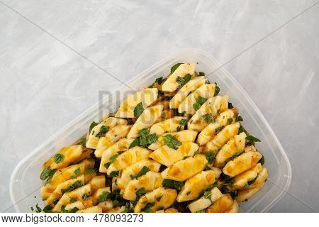 Traditional Asian Fruit Salad. Fermented Pineapple Slices With Mint Leaf In Cane Sugar Syrup. Sweet 
