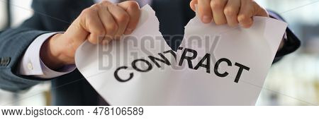 Businessman In Suit Tearing Paper Document Contract At Work In Office Closeup. Broken Or Breached Co