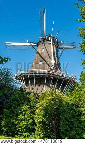 Historical Dutch Windmill De Bloem From 1768 In Amsterdam West On A Sunny Summer Day