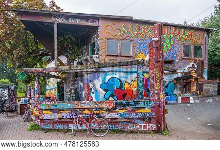 Copenhagen, Denmark - September 14, 2010: Christiania Freetown. Colorful Graffiti Cacophony On Walls