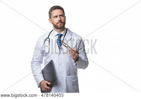 Pondering Doctor Presenting Emedicine On Background. Emedicine And Doctor Man With Laptop. Doctor Pr