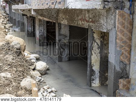 Damaged Hotel Building And Homes Caused By Flood Water At Bahrain Bazar In Swat Valley, Pakistan.