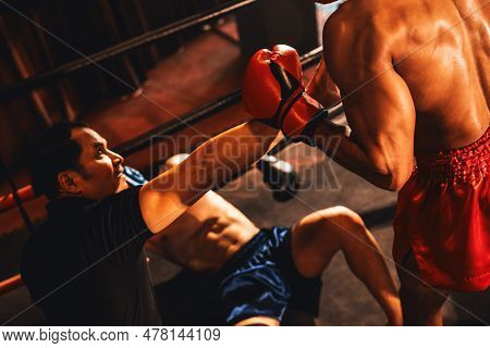 Boxing Referee Intervene, Halting The Fight To Check Fallen Competitor. Intense And Fierce Boxing Ma