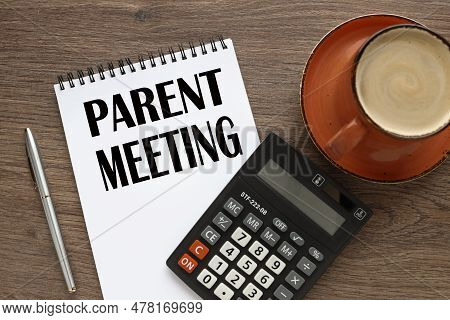 Parent Meeting Notepad With Text Near Calculator.